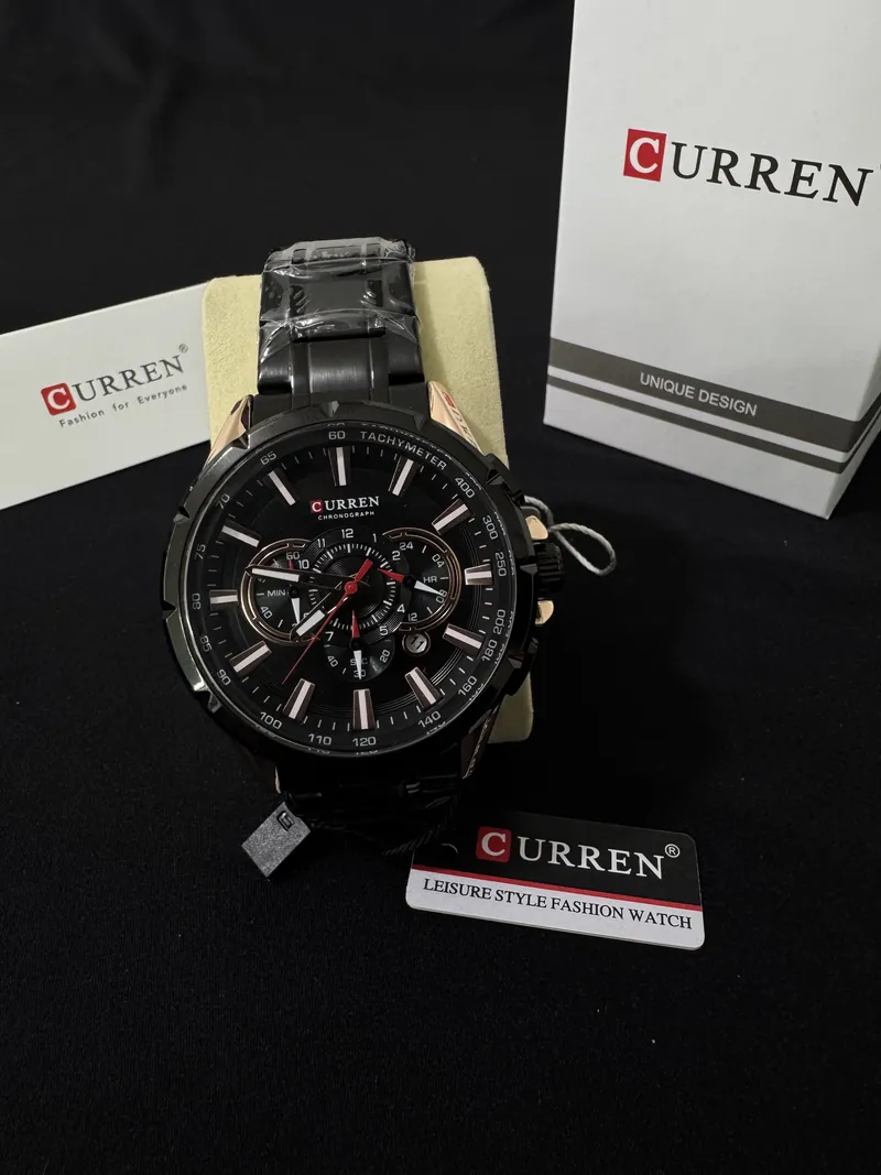 Curren 8363 negro con su caja y las etiquetas de la marca