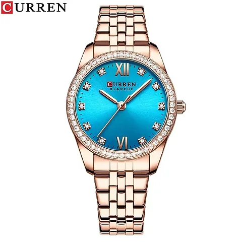 Curren 9086 en oro rosa y celeste
